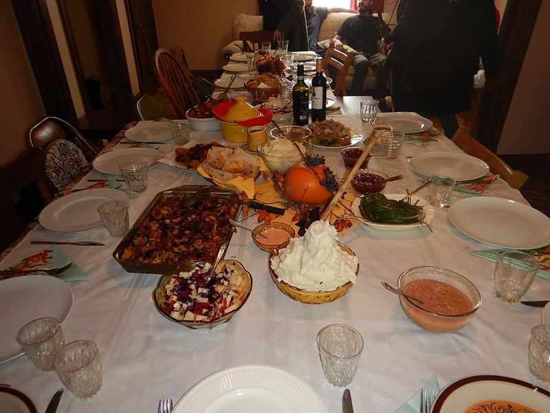 A holiday table filled with shared dishes
